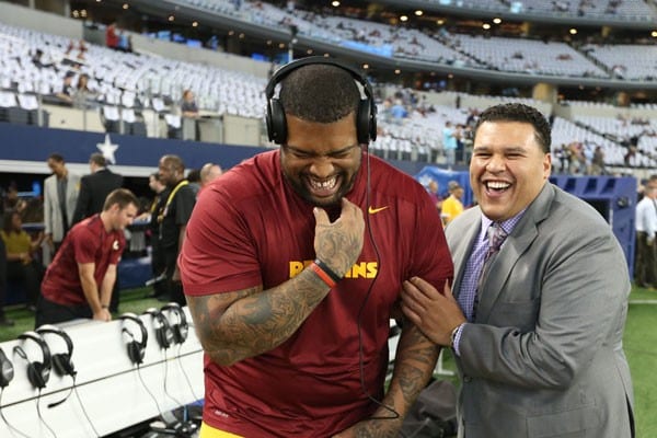 Offensive tackle Trent Williams (left) and Director of Pro Personnel Alex Santos (right) at the Dallas Cowboys’ AT&T Stadium.