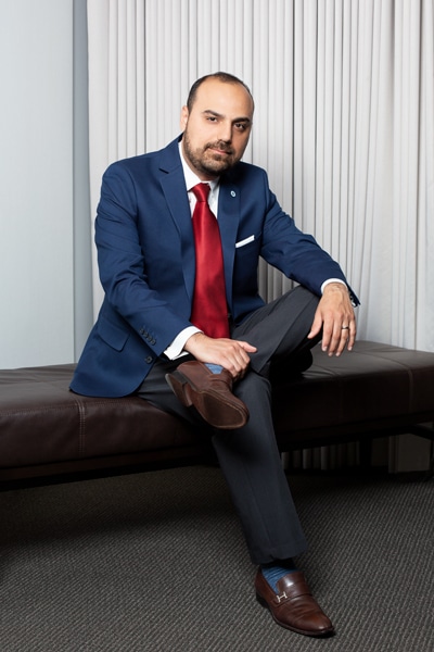 Edgar Mayorga, Johnson Controls, seated leg crossed