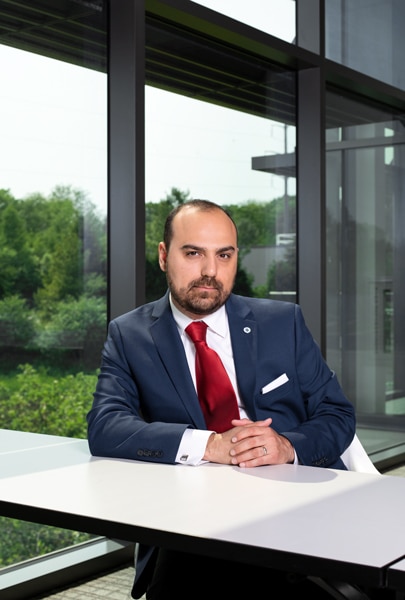 Edgar Mayorga, Johnson Controls, sitting hands folded, large