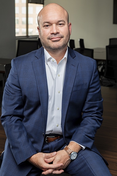 Ricardo Madan, TEKsystems, portrait office background