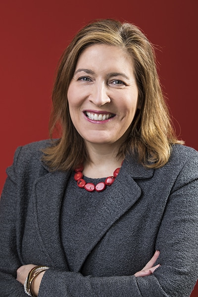 Beatriz Perez, SVP, The Coca-Cola Company, portrait red background