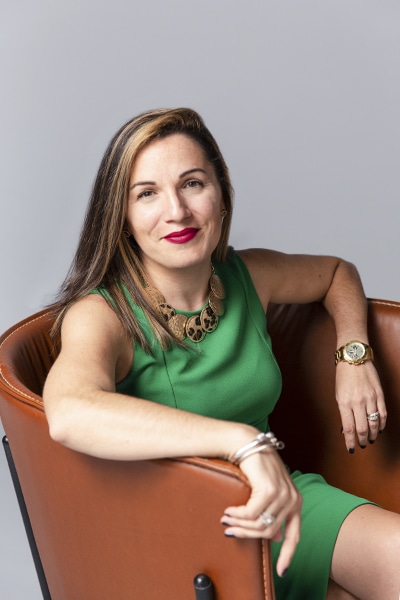 Jennifer Rodriguez, FCB Global, portrait sitting in brown chair