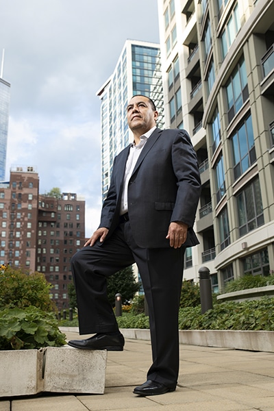 Martin Escutia, VP of Services for Mexical, Central American & Caribbean, Infinera, portrait outdoors standing looking up
