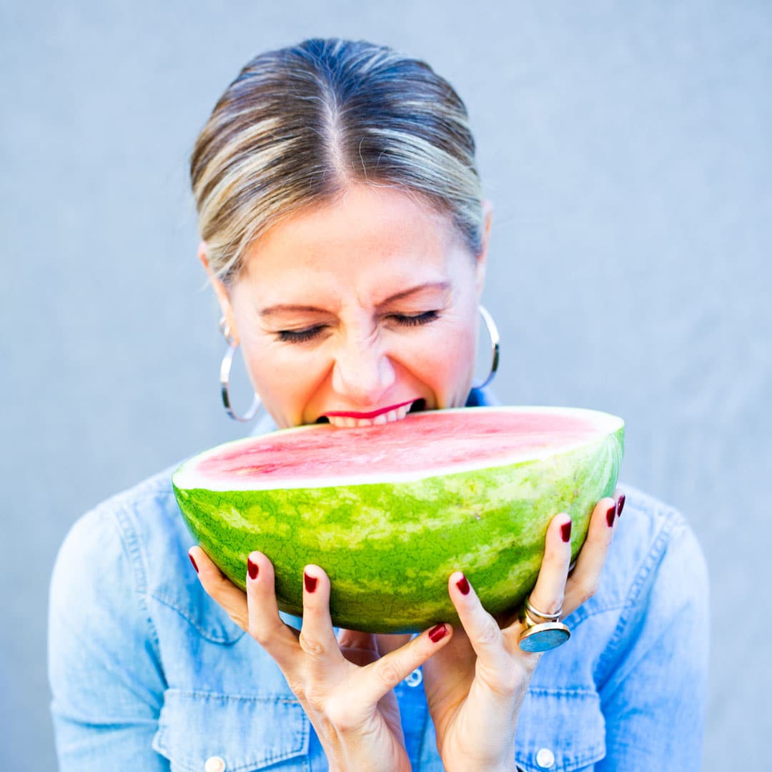 Alejandra Graf, biting into watermelon, thumb