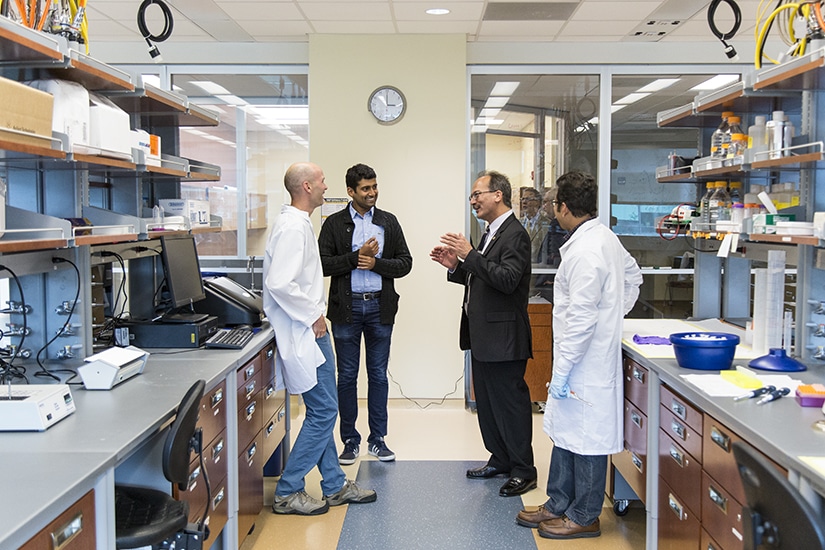 President-Elect Havidán Rodríguez is introduced by Prash Rangan to Bijan Dey and Ken Halvorsen of the RNA Institute