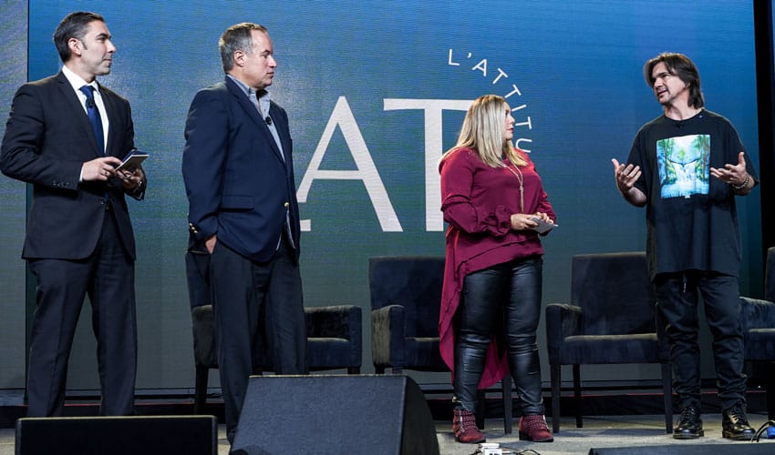 Juanes onstage discussing mainstream music at L'ATTITUDE 2019