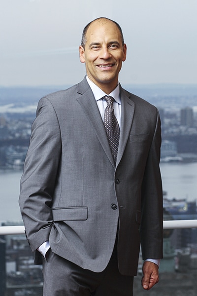 Andy Velez, portrait on balcony/rooftop