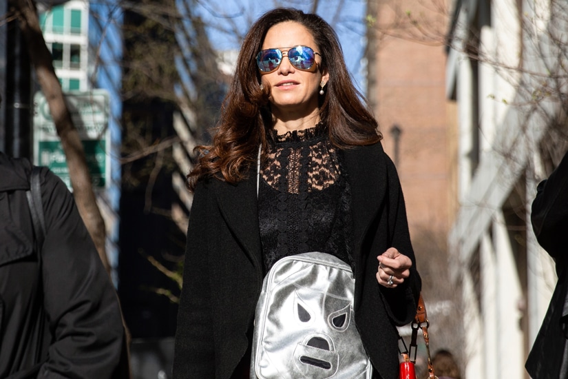 Claudia Romo Edelman walking outside