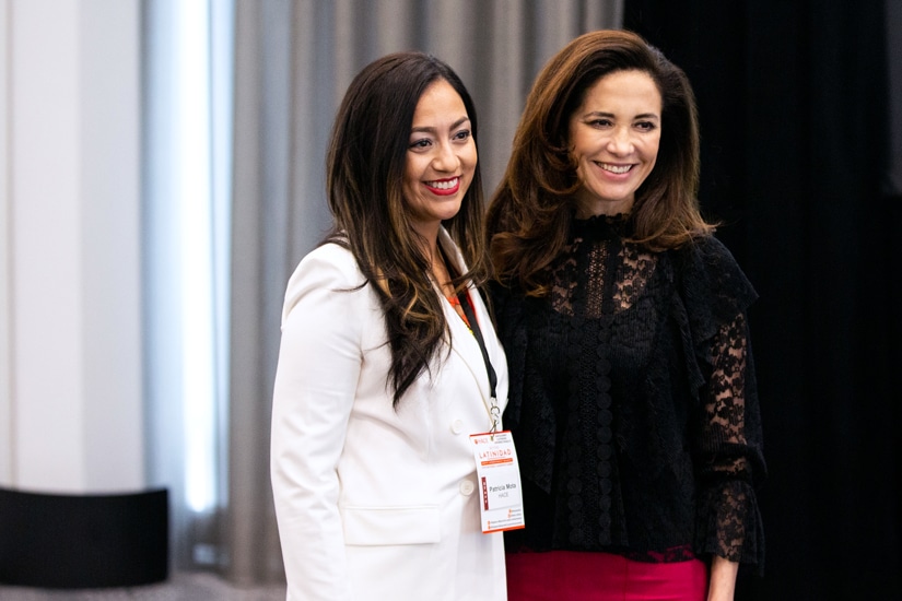 Claudia Romo Edelman poses with Patricia Mota at HACE event