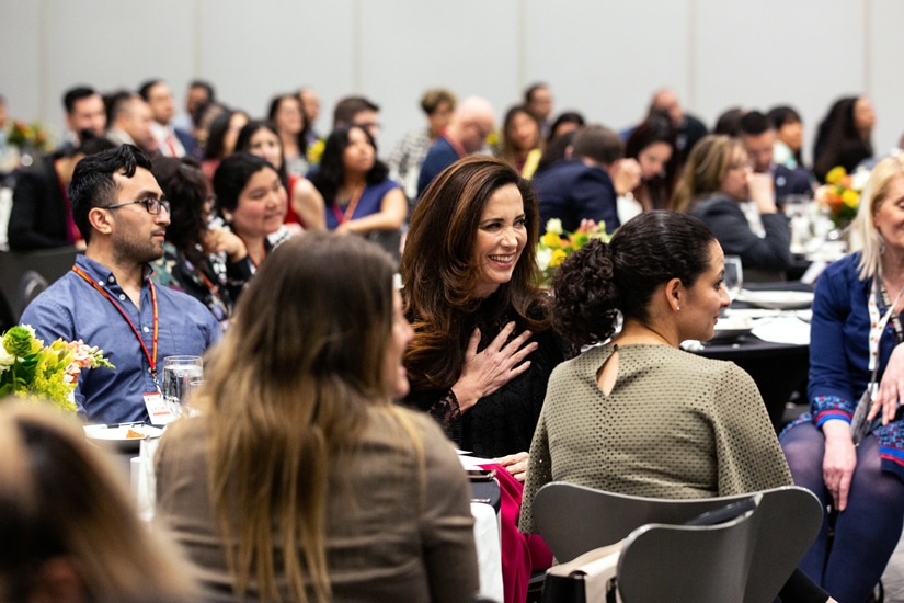 Claudia Romo Edelman in crowd at HACE summit