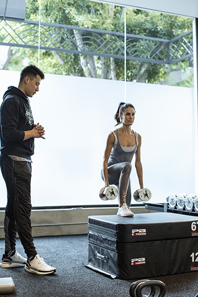 Andrea Trujill at Heart & Hustle, working out