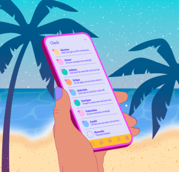 Checking phone on the beach