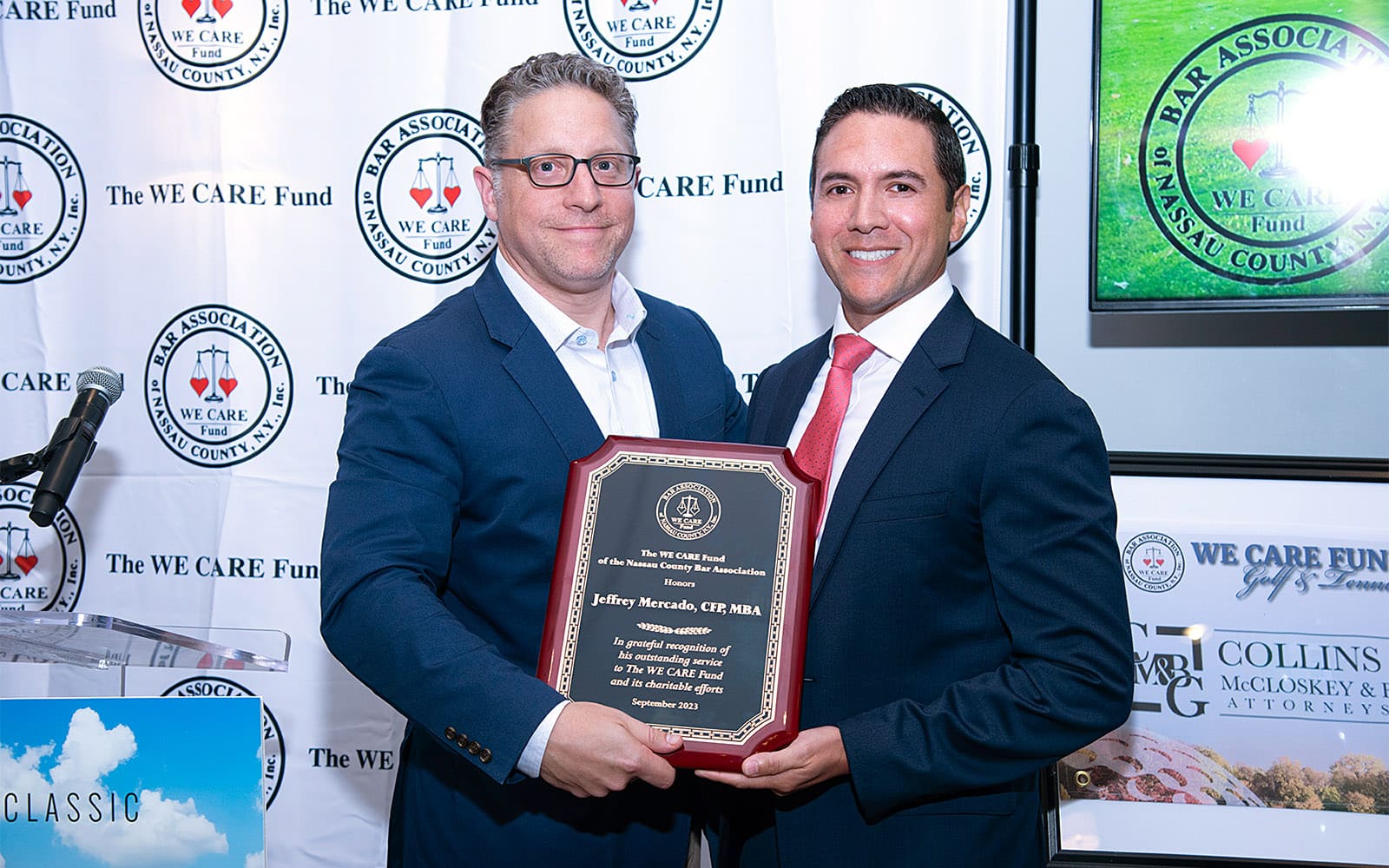 Receiving an award at the WECARE Golf and Tennis outing.