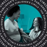 A nurse takes a pregnant Black woman's blood pressure with a blood pressure cuff