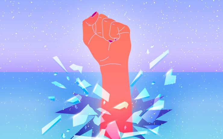 A woman's fist breaks through the glass ceiling, shattering it.