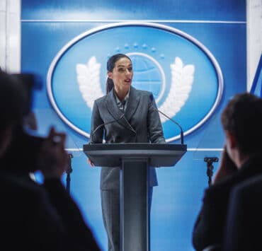 Woman standing at podium