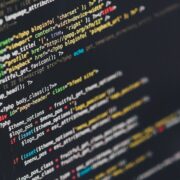 Code on a dark monitor